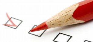 Red pencil and questionnaire